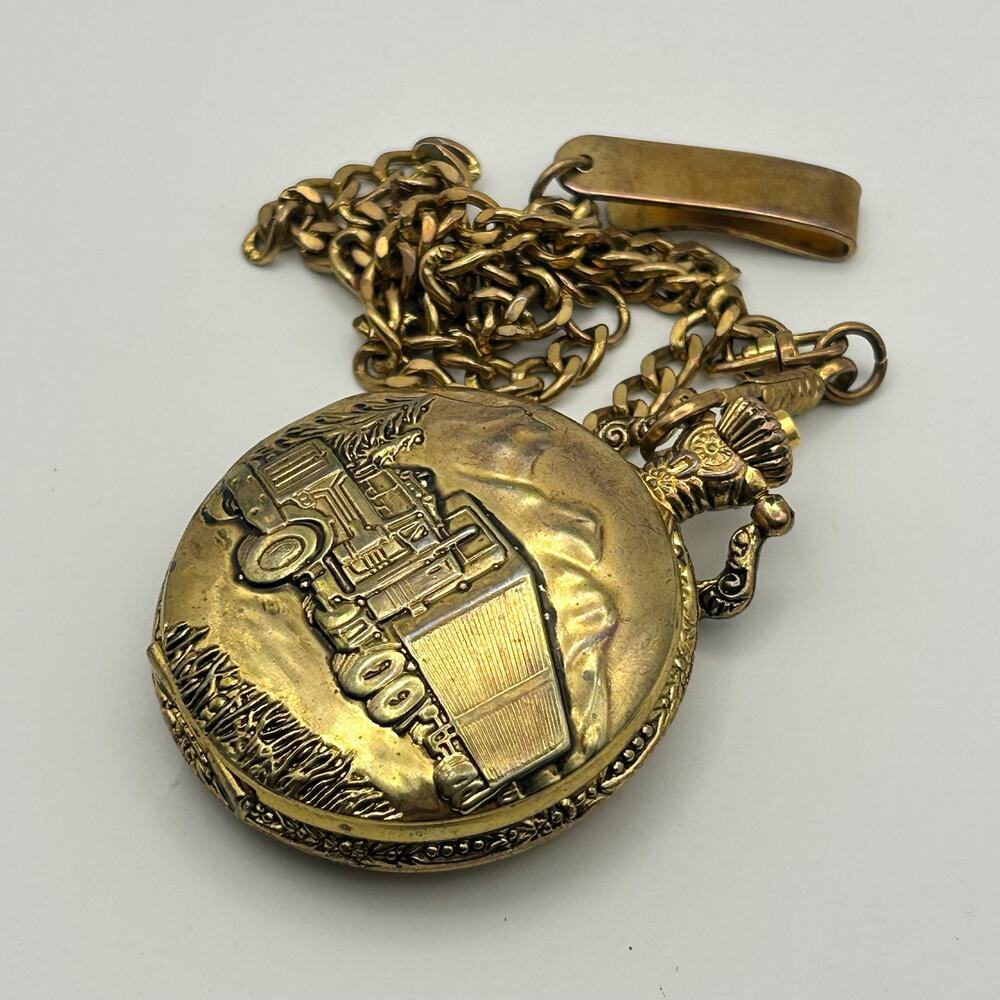 Vintage Details Gold Tone Truck Emblem Cover Pocket Quartz Watch